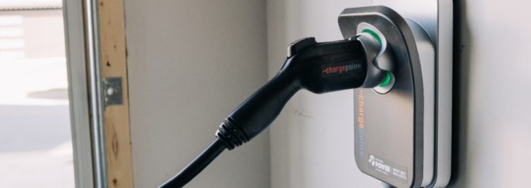 EV charger plugged into wall