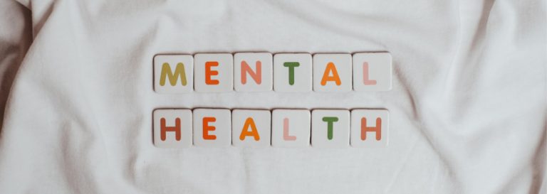 Letter tiles spelling out "Mental Health"